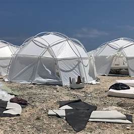 A stark reminder of hollow promises—luxury tents turned disaster relief.